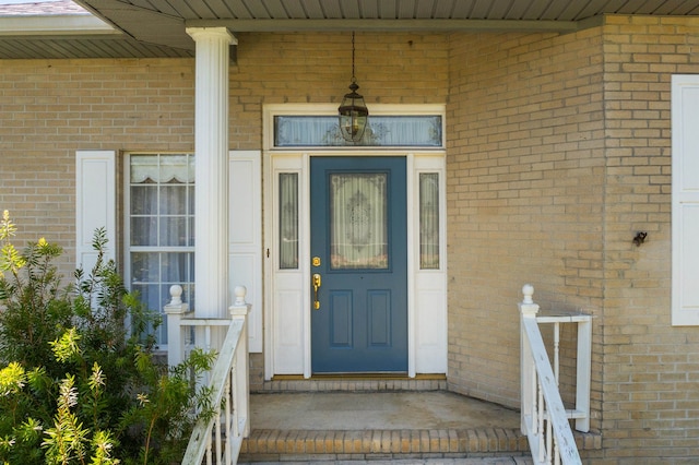 entrance to property with a porch