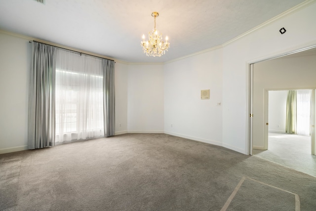 carpeted empty room featuring an inviting chandelier and crown molding