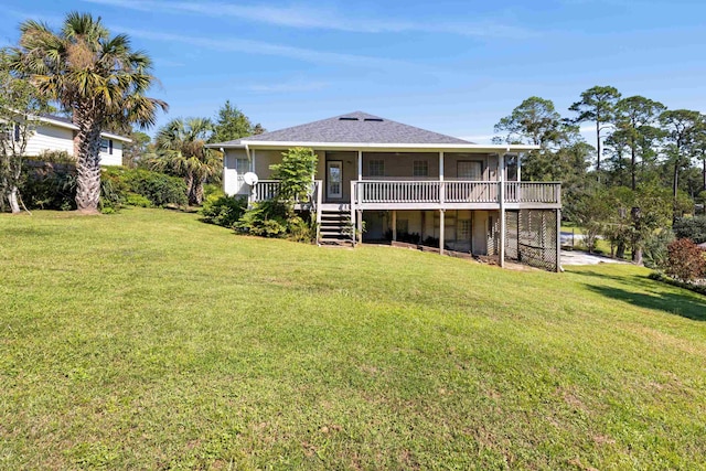 back of house featuring a lawn