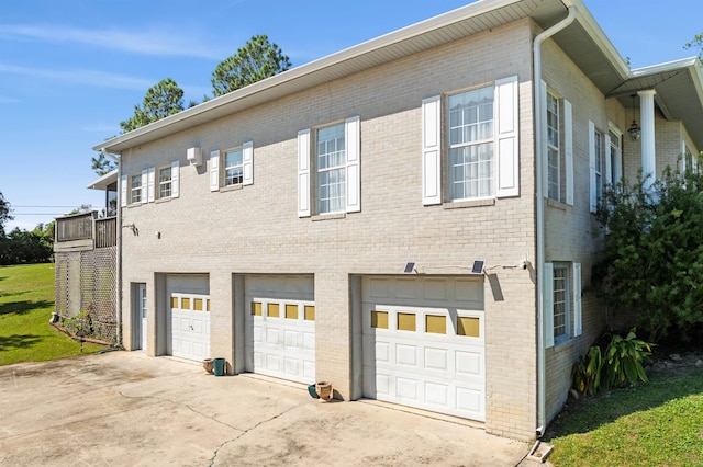 view of property exterior with a garage