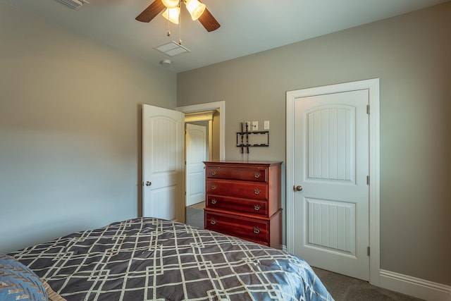 bedroom with ceiling fan and carpet flooring