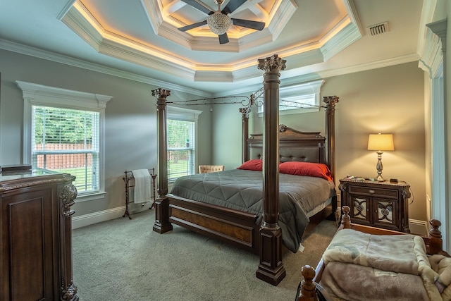 carpeted bedroom with ornamental molding, multiple windows, and ceiling fan