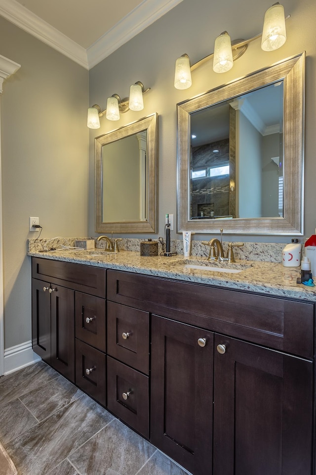 bathroom featuring vanity and crown molding