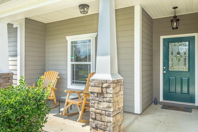 entrance to property with covered porch