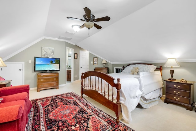 carpeted bedroom with ceiling fan and vaulted ceiling