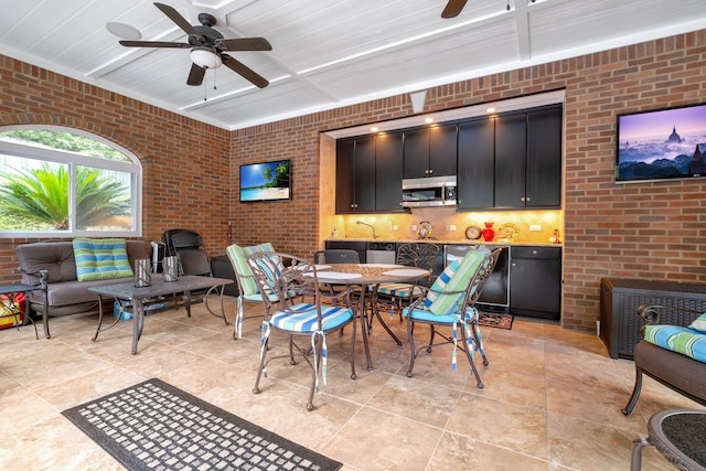 view of patio featuring ceiling fan and outdoor lounge area