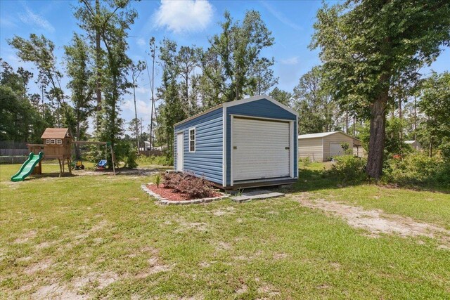 604 Judson Dr, Perry, FL 32348 - view of yard featuring a playground
