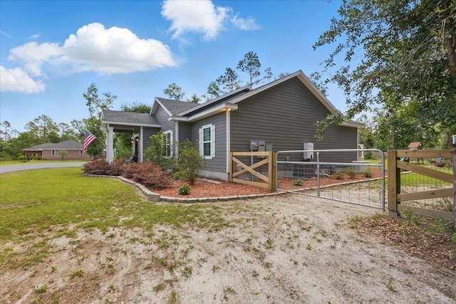 604 Judson Dr, Perry, FL 32348 - view of property exterior with a gate