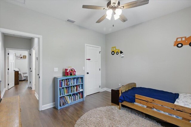 604 Judson Dr, Perry, FL 32348 - bedroom featuring wood finished floors, baseboards, and a ceiling fan