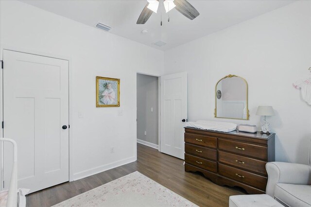 604 Judson Dr, Perry, FL 32348 - bedroom featuring dark wood-style floors, baseboards, and a ceiling fan