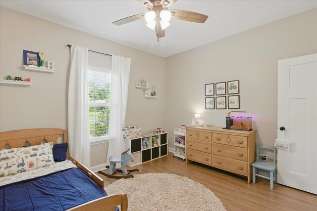 604 Judson Dr, Perry, FL 32348 - bedroom featuring wood finished floors, ceiling fan, and baseboards