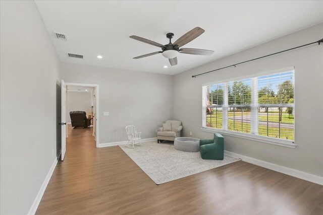 604 Judson Dr, Perry, FL 32348 - living area featuring wood finished floors, ceiling fan, baseboards, and recessed lighting