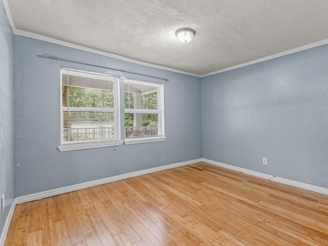 1487 Bainbridge Hwy, Quincy, FL 32352 - empty room featuring ornamental molding, wood finished floors, and a textured ceiling