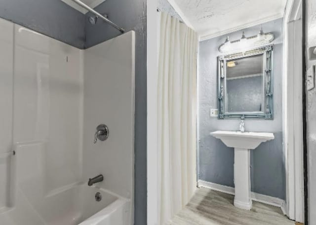 1487 Bainbridge Hwy, Quincy, FL 32352 - bathroom featuring wood finished floors and shower / bath combo