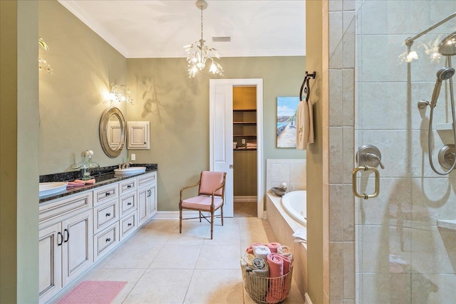 bathroom featuring tile patterned flooring, ornamental molding, separate shower and tub, vanity, and a notable chandelier