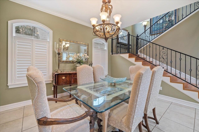 tiled dining area with ornamental molding and a notable chandelier