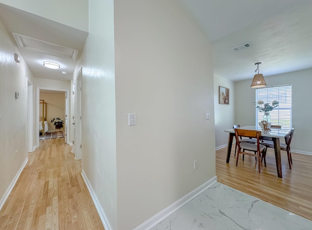 804 Medical Commons Ct, Tallahassee, FL 32310 - corridor featuring attic access and baseboards