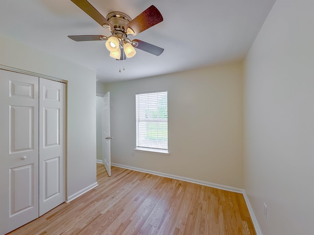 804 Medical Commons Ct, Tallahassee, FL 32310 - unfurnished bedroom featuring baseboards, light wood-style flooring, a closet, and ceiling fan