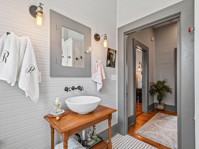 bathroom featuring hardwood / wood-style flooring and sink