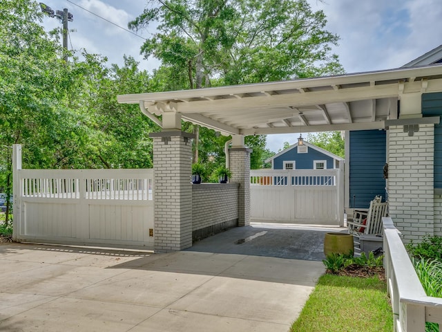 view of gate with a carport