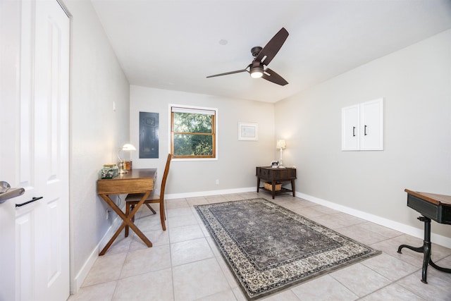 office with ceiling fan and light tile patterned floors