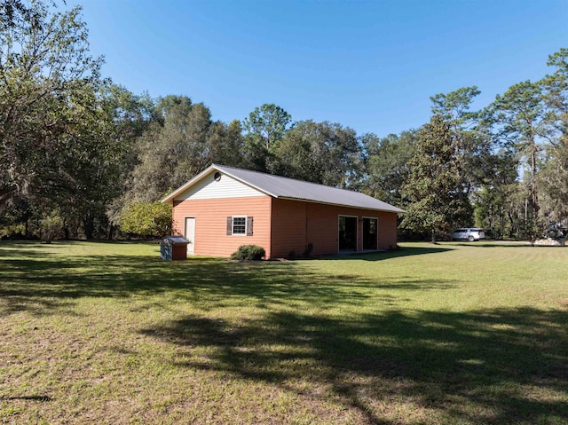 view of property exterior featuring a yard