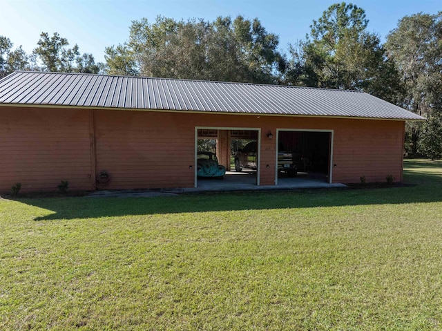 back of house with a yard