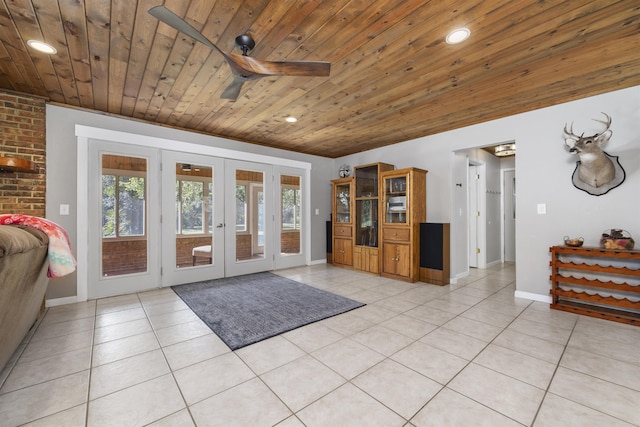 entryway featuring ceiling fan, wooden ceiling, light tile patterned floors, and french doors