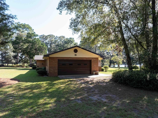 garage with a yard