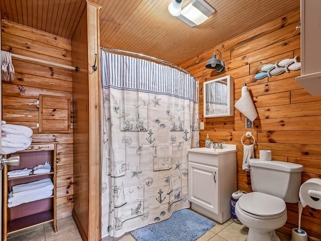 bathroom with toilet, wood walls, wood ceiling, vanity, and tile patterned flooring