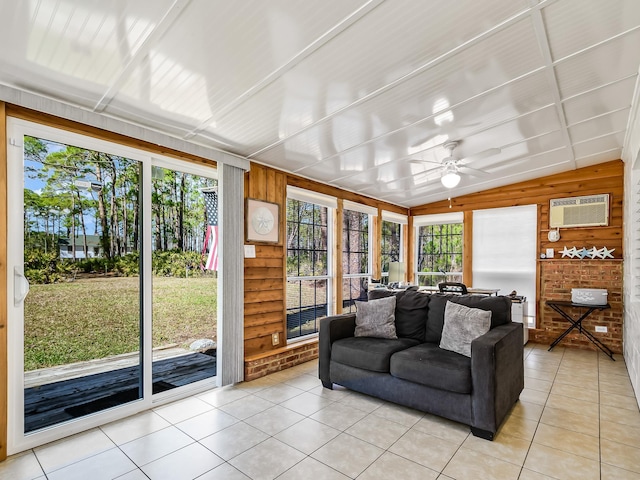 sunroom with ceiling fan, lofted ceiling, and a wall unit AC