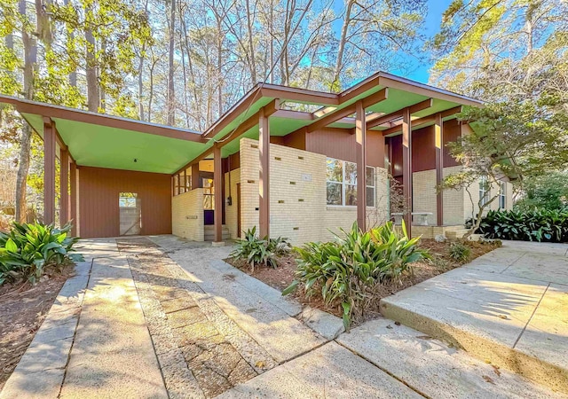 exterior space with a carport