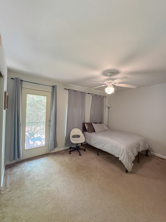 1417 Pullen Rd Unit 402, Tallahassee, FL 32303 - carpeted bedroom with access to outside, ceiling fan, and baseboards