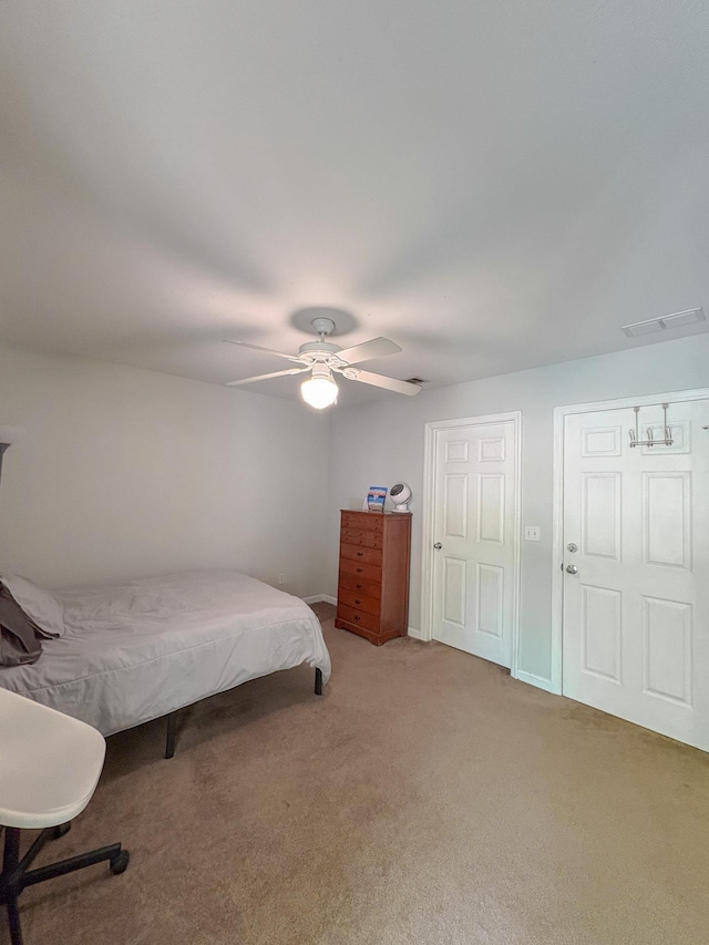 1417 Pullen Rd Unit 402, Tallahassee, FL 32303 - carpeted bedroom with ceiling fan and baseboards