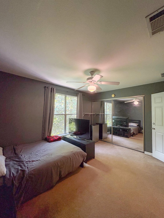 1417 Pullen Rd Unit 402, Tallahassee, FL 32303 - carpeted bedroom with a ceiling fan
