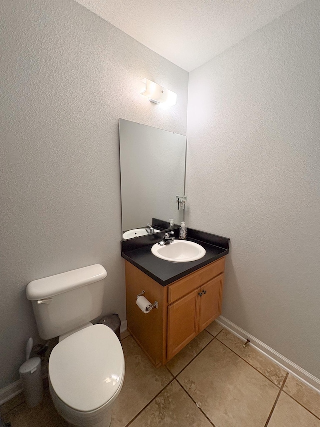 1417 Pullen Rd Unit 402, Tallahassee, FL 32303 - half bathroom with vanity, tile patterned floors, and toilet