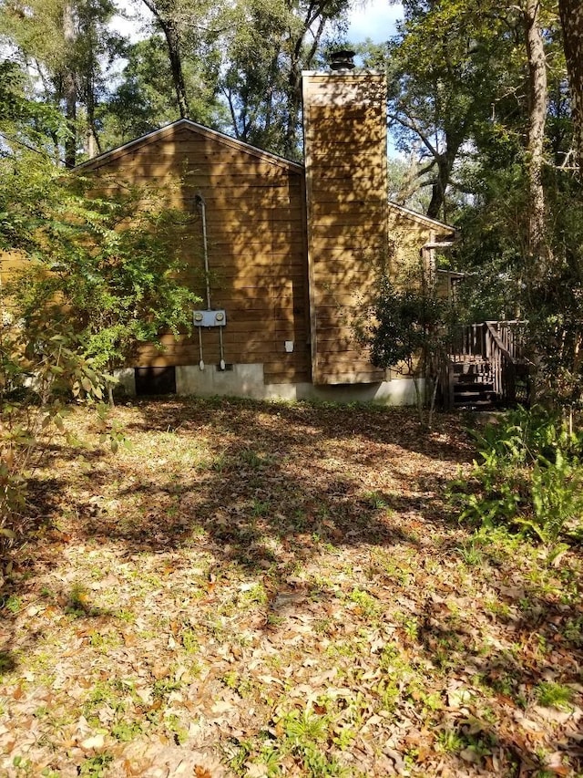 view of yard featuring a deck