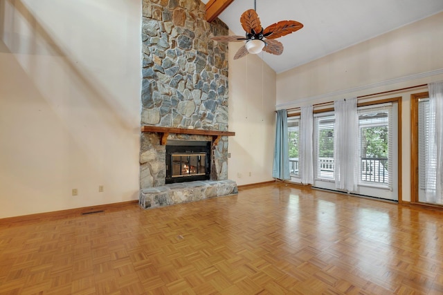 414 Tharpe Cir, Quincy, FL 32351 - unfurnished living room with high vaulted ceiling, baseboards, ceiling fan, a stone fireplace, and beam ceiling