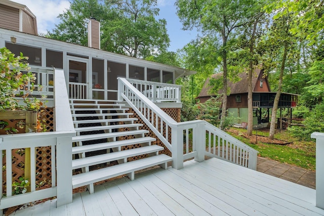 414 Tharpe Cir, Quincy, FL 32351 - wooden deck with a sunroom and stairs
