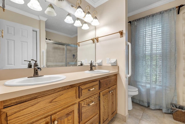 414 Tharpe Cir, Quincy, FL 32351 - full bathroom with a stall shower, toilet, double vanity, tile patterned flooring, and crown molding