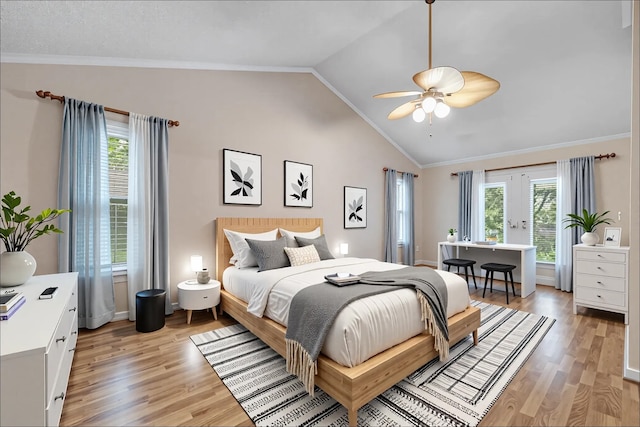 414 Tharpe Cir, Quincy, FL 32351 - bedroom featuring vaulted ceiling, light wood-style floors, crown molding, ceiling fan, and french doors