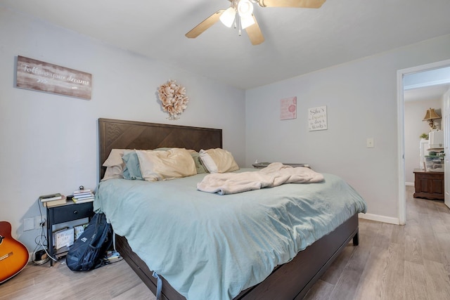 2401 Lanrell Dr, Tallahassee, FL 32303 - bedroom featuring wood finished floors, ceiling fan, and baseboards