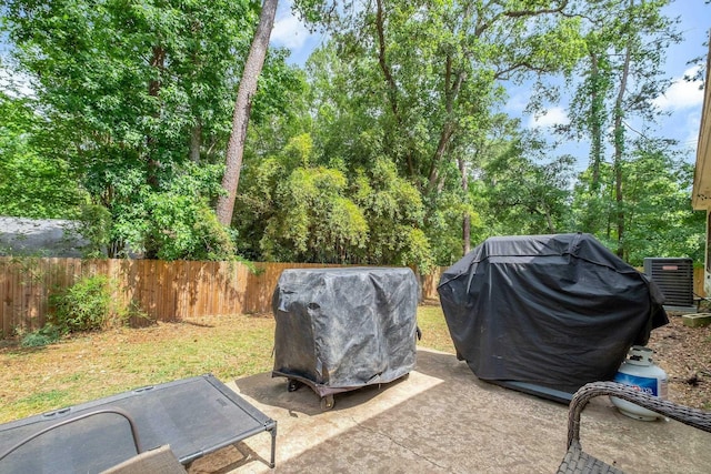 2401 Lanrell Dr, Tallahassee, FL 32303 - view of patio featuring a grill and central AC
