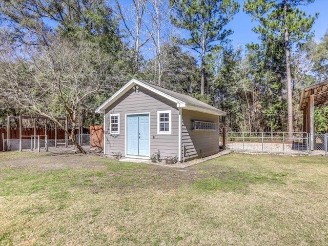 view of outdoor structure with a yard