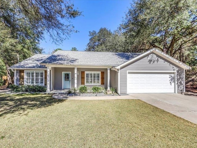 ranch-style home with a front lawn and a garage