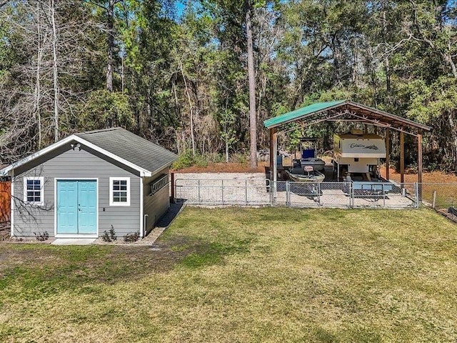 view of yard with a storage unit