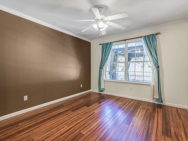 unfurnished room featuring ornamental molding, dark wood-type flooring, and ceiling fan