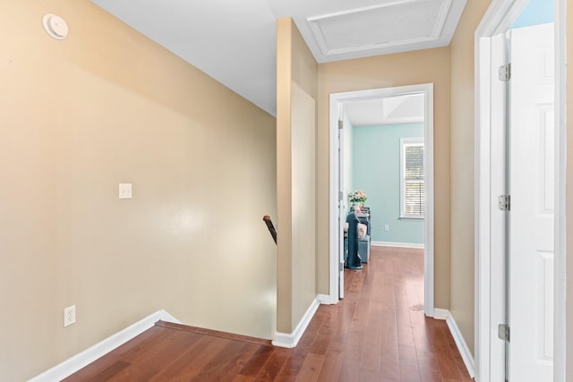 hall with dark wood-type flooring