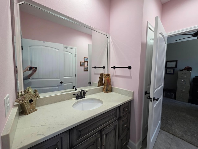 bathroom with vanity and tile patterned floors