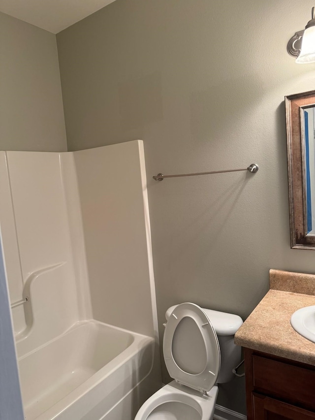 full bathroom featuring toilet, vanity, and shower / bath combination